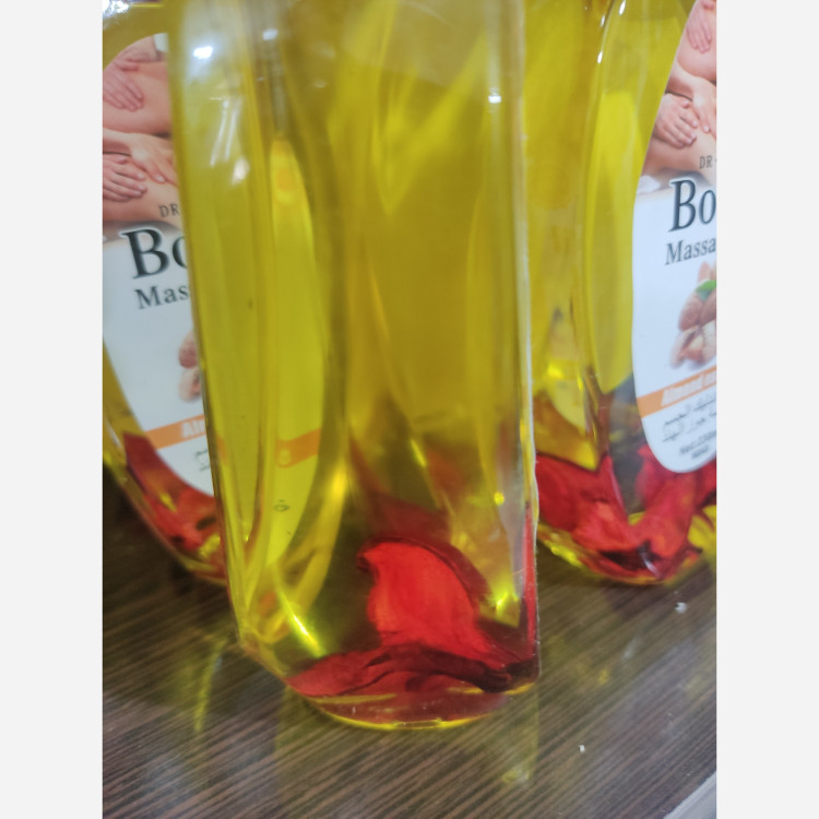 روغن ماساژ تقویتی و درمانی دکتر بوجای حجم 230 میل با عصاره روغن بادام